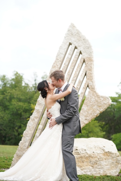 Image of Yangyang and Anthony Kissing on Wedding